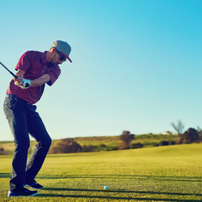 Senior golfer reviewing and updating golf equipment to match an evolving swing for improved performance on the golf course.